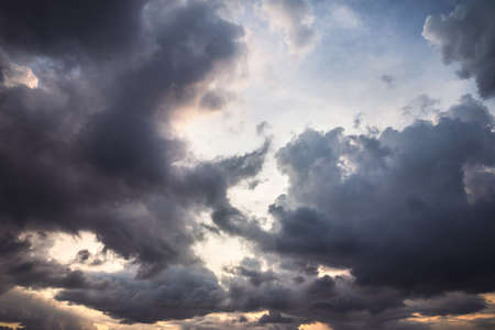 Background of beautiful dramatic sunset skyの写真素材