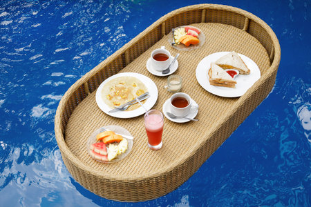 Delicious floating breakfast in the swimming pool