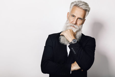 Handsome aged man wearing stylish black suit
