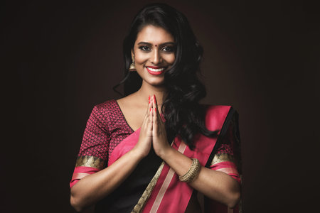 Beautiful Indian woman wearing traditional sari dress