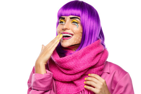 Model in creative image with pop art makeup