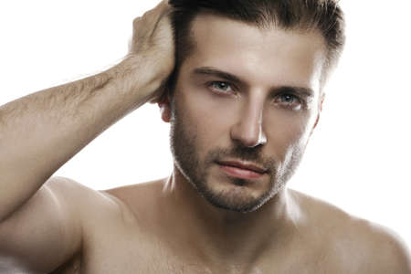 Young and handsome man on white backgroundの写真素材