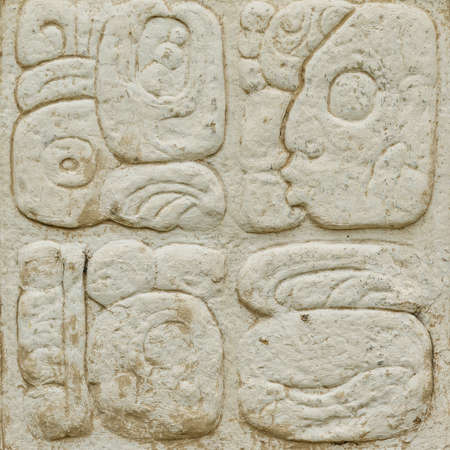 Ancient Maya script carved on the stone wallの写真素材