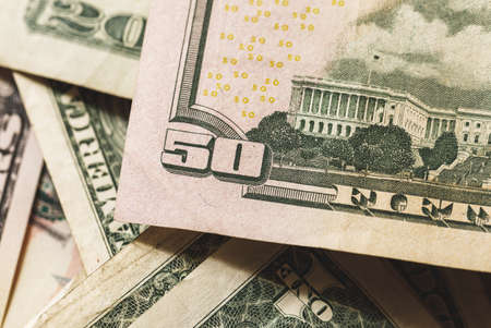 Close-up of the different US dollar bills.の写真素材