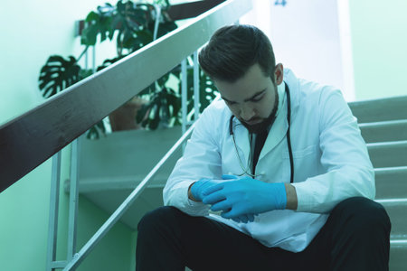 Exhausted doctor after long shift in the hospital