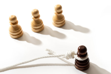 Black pawn with a hangmans loop on a neck