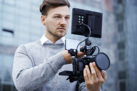 Professional videographer with a modern camera rigの写真素材