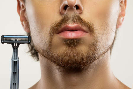 Man with unkempt beard before a shaving routineの写真素材