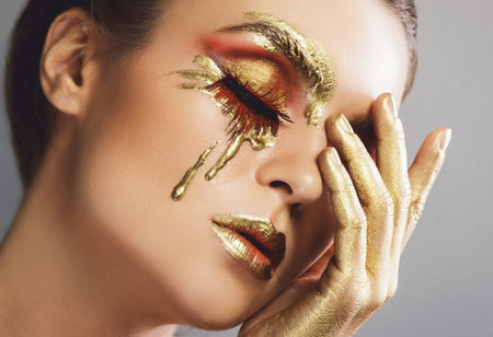 Female face with a beautiful creative makeup