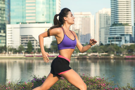 Woman in the city during her running workout