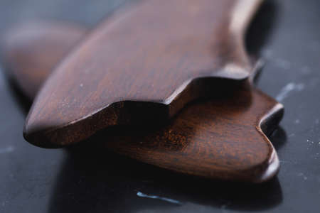 Wooden scraper tool for Gua Sha massageの写真素材