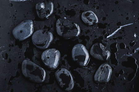 Closeup of black hot rocks for stone massageの写真素材
