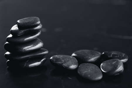 Closeup of black hot rocks for stone massageの写真素材