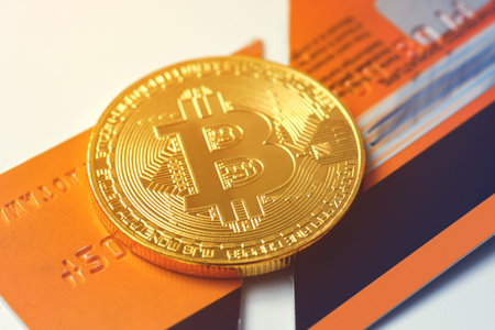 Bitcoin and broken credit card on white background