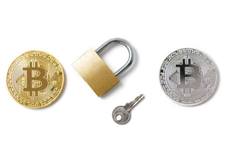 Bitcoin coins and padlock on white backgroundの写真素材
