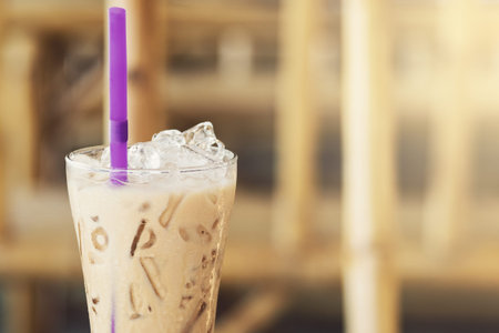 Close up with glass of cold iced coffee