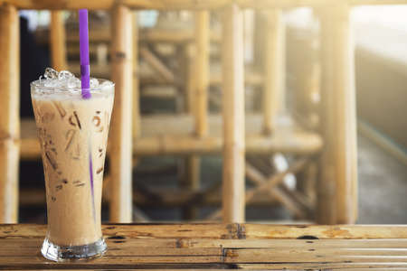 Glass of cold iced coffee on the tableの写真素材