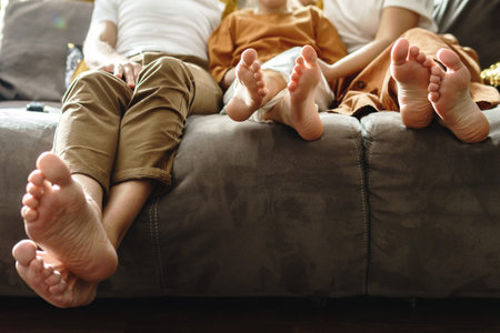 Family sitting on a sofa in the living room