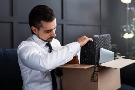 Young man getting fired from his job