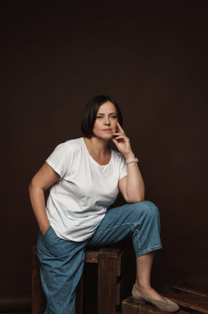 Portrait of a beautiful middle aged woman posing in a studio