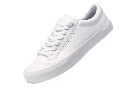 Trainers - white leather shoe on white backgroundの写真素材