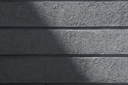 Stucco wall providing a unique backdrop for design