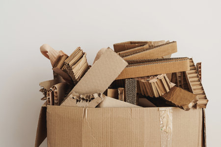 Cardboard box full of Paper Packaging Waste. Concepts of Paper Recycling and Waste Sortingの写真素材