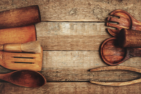 Set of various wooden kitchen utensils on the tableの写真素材