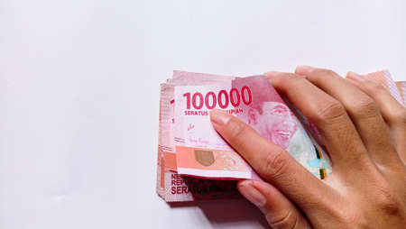 Currency of 100 thousand rupiah, the state currency of Indonesia, 23-March, 2021の写真素材