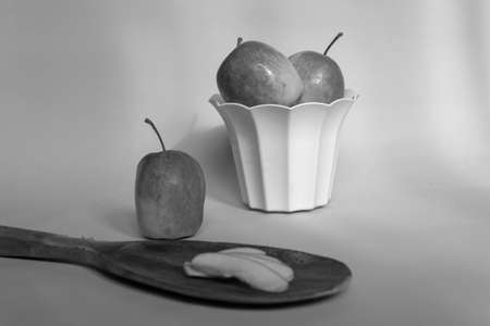A split apple with a blue background, a perfect photo for a food floggerの写真素材