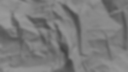 background blur photo with a red base color, very suitable as a backgroundの写真素材
