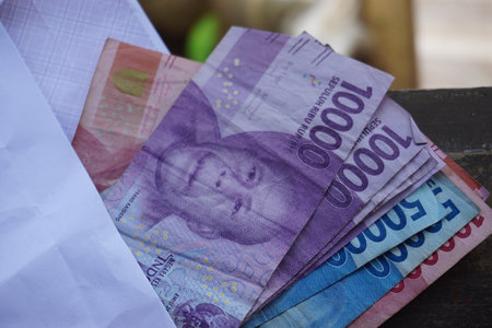 Stock photo of the Indonesian rupiah, the official currency of Indonesia. suitable for money help themeの写真素材