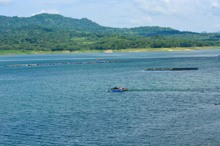 Photo of a reservoir with a freshwater fish farming pondの写真素材