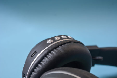 May 2023, Wonosobo Indonesia: Black headphones on a blue background.