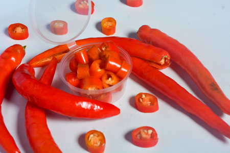 Scene of the red chili which looks very hot against a white background. No people.の写真素材