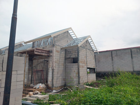 An unfinished house made from concrete blocks and steel structureの写真素材