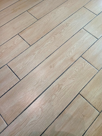 Light brown ceramic tiles with wood grain textureの写真素材