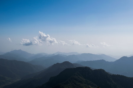 Mountain, cloud and blue sky background.