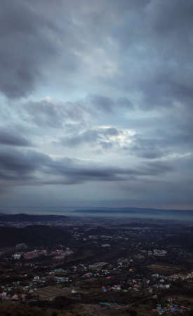 Landscape photography of clouds hovering over the moutnainsの写真素材