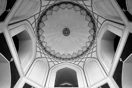 Black and white low angle interior architecture photograph of a vintage historical building with...