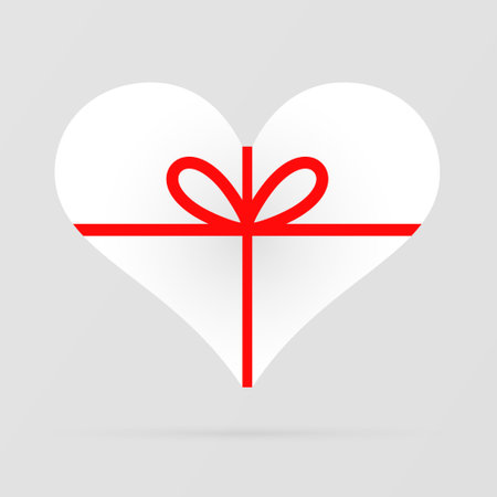 Gift Heart Icon. White gift box in the shape of a heart tied with red ribbons with a bow. Heart decoration. Love and celebration concept. Vector illustrationのイラスト素材