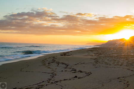 beautiful sunrise on a beach dessertの写真素材