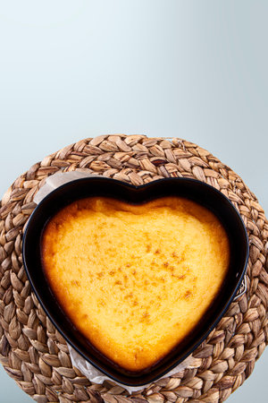 top view of heart-shaped cheesecake base mold with copy spaceの写真素材