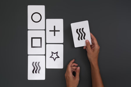 top view woman playing with zener cardsの写真素材