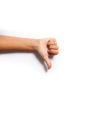 thumbs up unlike hand isolated with white background with shadow