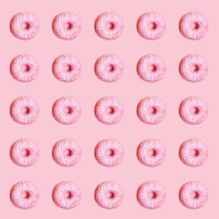 Seamless pattern of pink donut with pink backgroundの写真素材