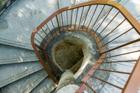 Old and rustic spiral staircaseの写真素材