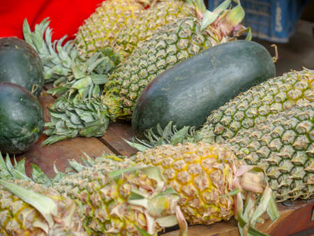 Pile of pinapples ready to be sold in a Indian local marketの写真素材
