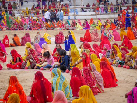 Pushkar, Rajasthan / India - November 5, 2019 : Village women showing dance performance at pushkar city desert fair ground stadium in traditional dresses at indiaâs biggest cattleのeditorial素材