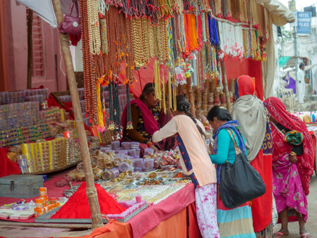 Pushkar, Rajasthan / India - November 5, 2019 : Street market in rural India. Crowded busy Street...